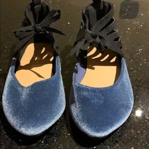 Black and blue suede shoes
